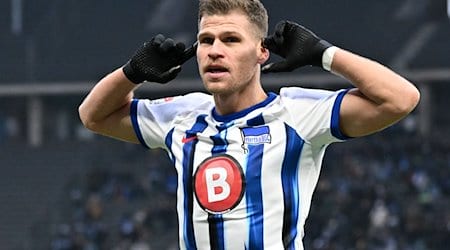 Florian Niederlechner jubelt im Olympiastadion. / Foto: Soeren Stache/dpa/Archivbild