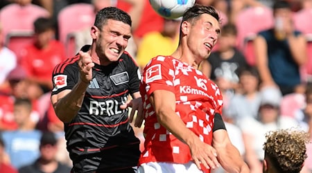 Robin Gosens (l) wird für den 1. FC Union Berlin so schnell kein Kopfballduell mehr bestreiten. / Foto: Torsten Silz/dpa