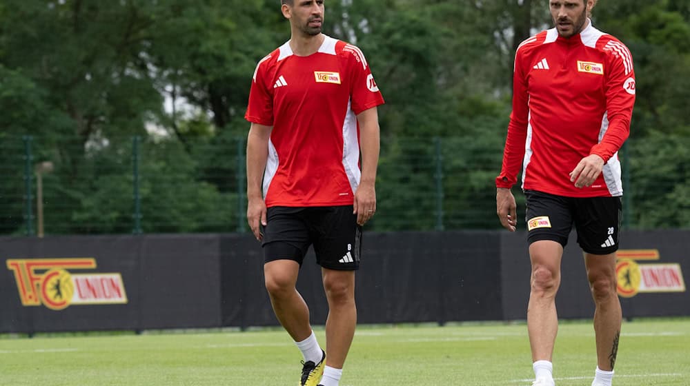 Die beiden Union-Kapitäne Khedira und Trimmel müssen noch mit dem Trainings aussetzen. / Foto: Soeren Stache/dpa