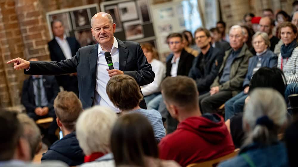 Beim Bürgerdialog beantwortete Kanzler Olaf Scholz auch eine Frage nach Nord Stream. / Foto: Fabian Sommer/dpa