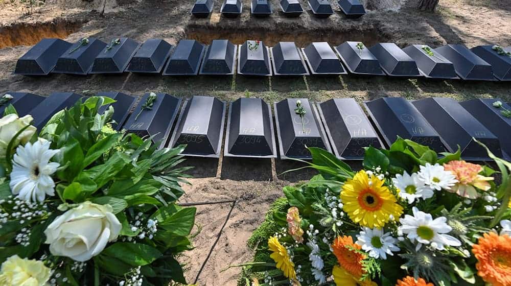 In Halbe wurden 100 deutsche Kriegstote eingebettet. / Foto: Patrick Pleul/dpa