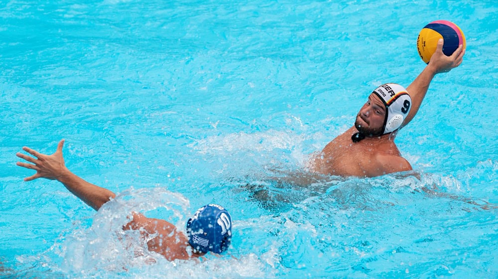 Marko Stamm (r) konnte die Niederlagen nicht abwenden. (Archivbild) / Foto: Bernd Thissen/dpa