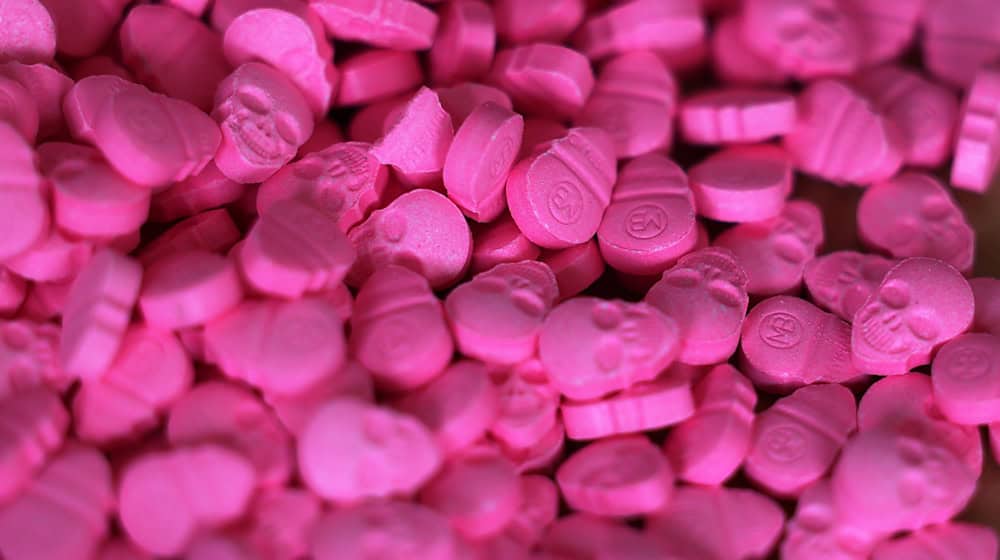 Oft als Partydroge konsumierte Ecstasy-Tabletten haben eine gefährliche Wirkung. Es kommt zu Vergiftungen und auch zu Todesfällen. (Symbolbild) / Foto: Oliver Berg/dpa