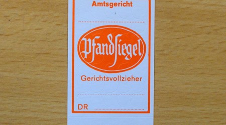 Gerichtsvollzieher nutzen Pfandsiegel, um gepfändete Wertgegenstände zu kennzeichnen. (Symbolbild) / Foto: Klaus-Dietmar Gabbert/dpa