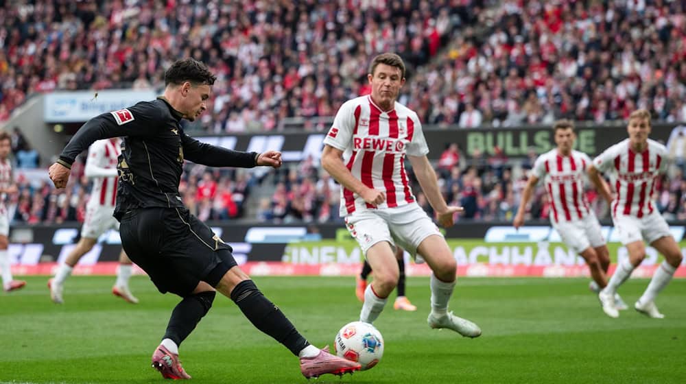 Wieder fit: Kölns Dominique Heintz (M). (Archivbild)  / Foto: Marius Becker/dpa