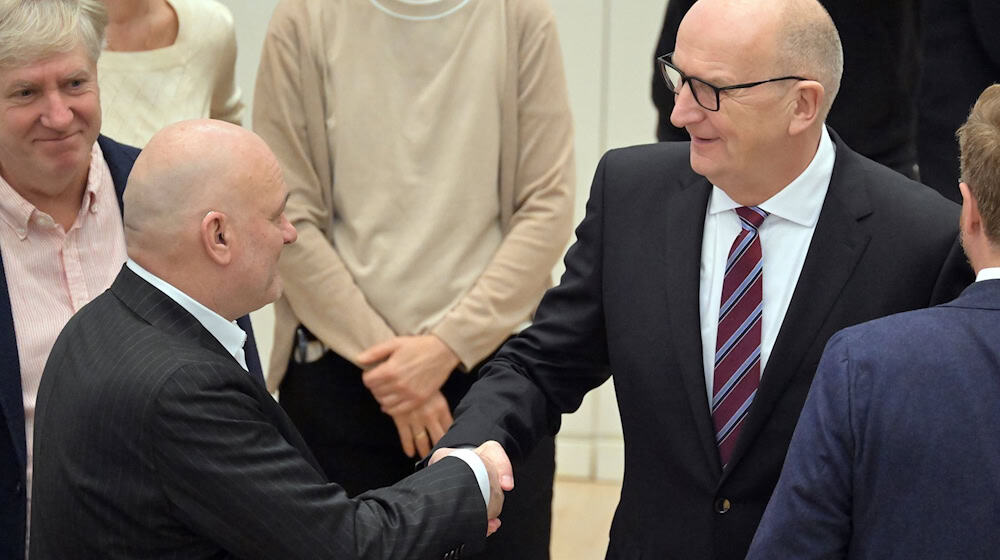 Die SPD/BSW-Koalition in Brandenburg von SPD-Ministerpräsident Dietmar Woidke und seinem BSW-Stellvertreter Robert Crumbach ist ein Jahr im Amt (Archivbild). / Foto: Michael Bahlo/dpa