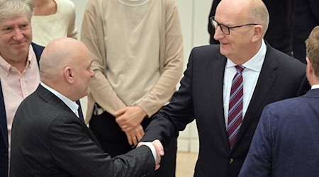 Die SPD/BSW-Koalition in Brandenburg von SPD-Ministerpräsident Dietmar Woidke und seinem BSW-Stellvertreter Robert Crumbach ist ein Jahr im Amt (Archivbild). / Foto: Michael Bahlo/dpa