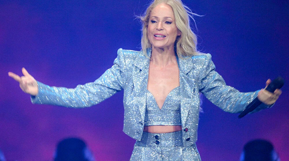 «Ich liebe dich über alles», sagte Schlagersängerin Michelle bei ihrem Abschiedskonzert zu ihrem Partner Eric Philippi. (Archivbild) / Foto: Jens Kalaene/dpa