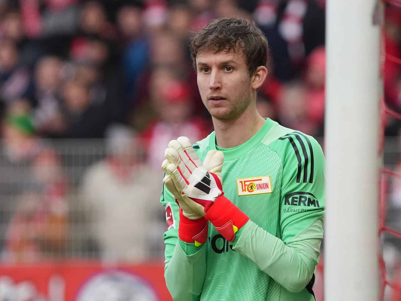 Union Keeper Frederik Rönnow verletzte sich im Training. (Archivbild) / Foto: Soeren Stache/dpa