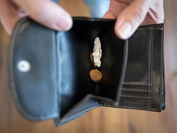 Kritiker der geplanten Reformen im Bund fürchten, viele Menschen könnten bald weniger Geld im Portemonnaie haben. (Symbolbild)  / Foto: Peter Steffen/dpa