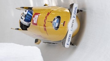 Das Team Francesco Friedrich aus Deutschland in Aktion, hier beim Bob-Weltcup in St. Moritz. Foto: Urs Flueeler/KEYSTONE/dpa/archivbild