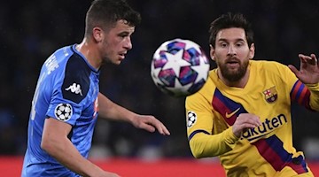 Diego Demme (l) aus Neapel und Lionel Messi aus Barcelona in Aktion. Foto: Alfredo Falcone/dpa/Archivbild