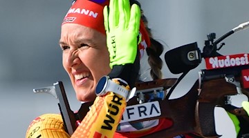 Denise Herrmann aus Deutschland beim Anschießen. Foto: Hendrik Schmidt/dpa/Archivbild