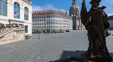 Der leere Neumarkt vor der Frauenkirche. Foto: Robert Michael/dpa-Zentralbild/dpa