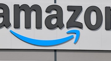 Das Logo von Amazon ist zu sehen. Foto: Patrick Pleul/dpa-Zentralbild/dpa/Symbolbild