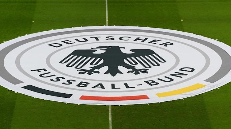 Das Logo des DFB. Foto: Hendrik Schmidt/dpa/Symbolbild