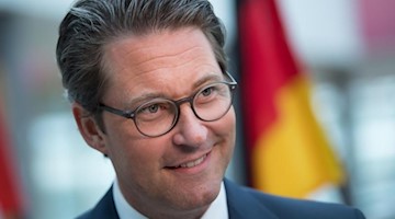 Andreas Scheuer (CSU), Bundesverkehrsminister, spricht. Foto: Hendrik Schmidt/zb/dpa/Archivbild
