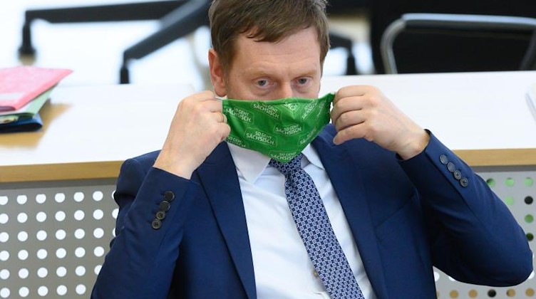 Sachsens Regierungschef Michael Kretschmer (CDU) nimmt an einer Landtagssitzung teil. Foto: Sebastian Kahnert/dpa-Zentralbild/dpa/Archivbild