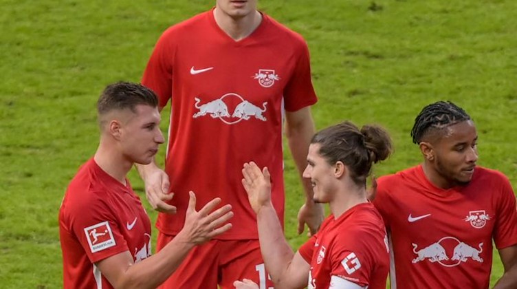 RB Leipzig in einem Stadion. Foto: Soeren Stache/dpa POOL/dpa