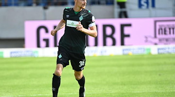 Christian Groß in Aktion für den SV Werder Bremen. Foto: Uli Deck/dpa/Archivbild