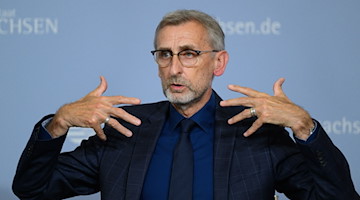 Armin Schuster (CDU), Innenminister in Sachsen. / Foto: Robert Michael/dpa