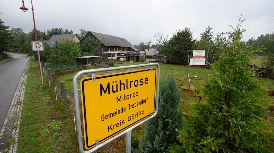 Das Ortseingangschild von Mühlrose. / Foto: Robert Michael/dpa-Zentralbild/dpa/Archivbild