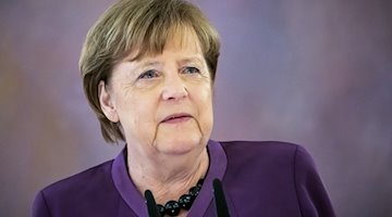 Angela Merkel, (CDU), ehemalige Bundeskanzlerin, spricht. / Foto: Michael Kappeler/dpa