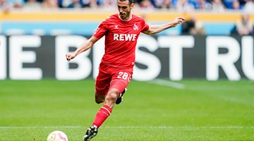 Kölns Ellyes Skhiri spielt den Ball. / Foto: Uwe Anspach/dpa