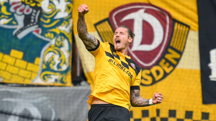 Dynamo's Manuel Schäffler celebrates after his goal to make it 2-0 / Photo: Robert Michael/dpa