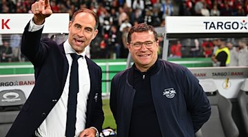 Max Eberl (r), Sportvorstand von RB Leipzig und Oliver Mintzlaff, Geschäftsführer, Red Bull GmbH, nach der Partie. / Foto: Tom Weller/dpa