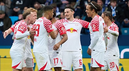 Los jugadores del Leipzig celebran un gol / Foto: Bernd Thissen/dpa