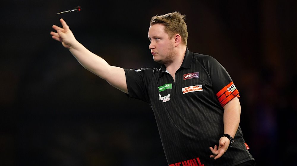 Martin Schindler in action. The 27-year-old celebrated the first title of his PDC career / Photo: Zac Goodwin/PA Wire/dpa/Archivbild