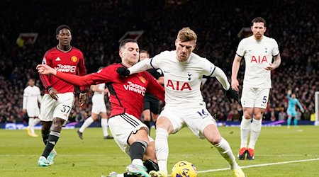 Manchester United's Diogo Dalot and Tottenham's Timo Werner (2nd from right) in action. Werner is out for the rest of the season with an injury / Photo: Andrew Yates/CSM via ZUMA Press Wire/dpa