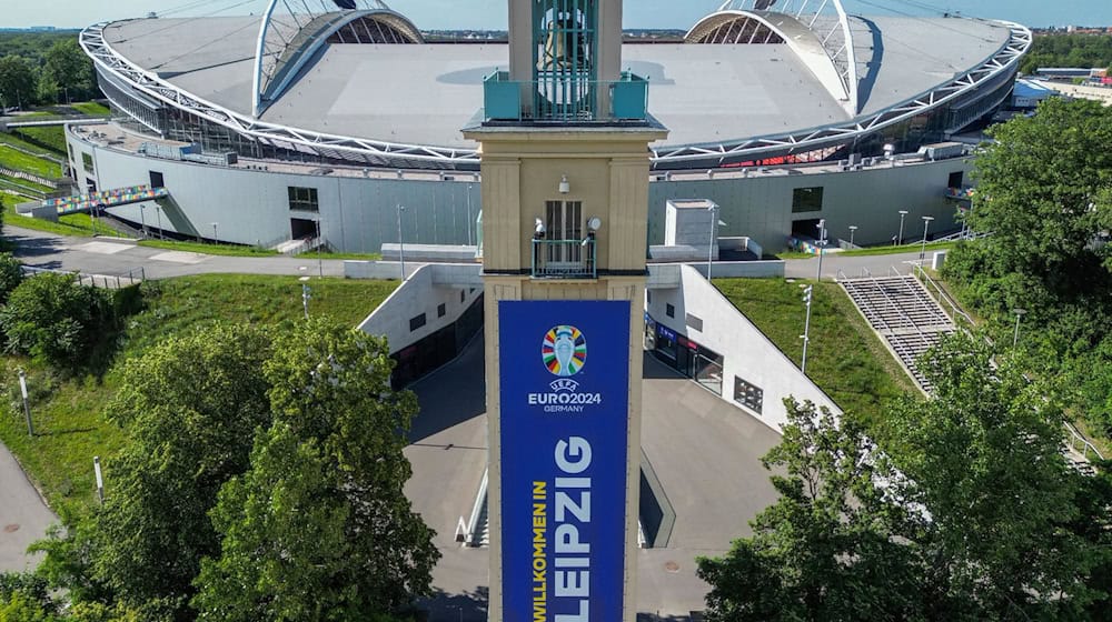 View of the Leipzig stadium, also known as the Red Bull Arena, and the bell tower before the European Football Championship / Photo: Jan Woitas/dpa
