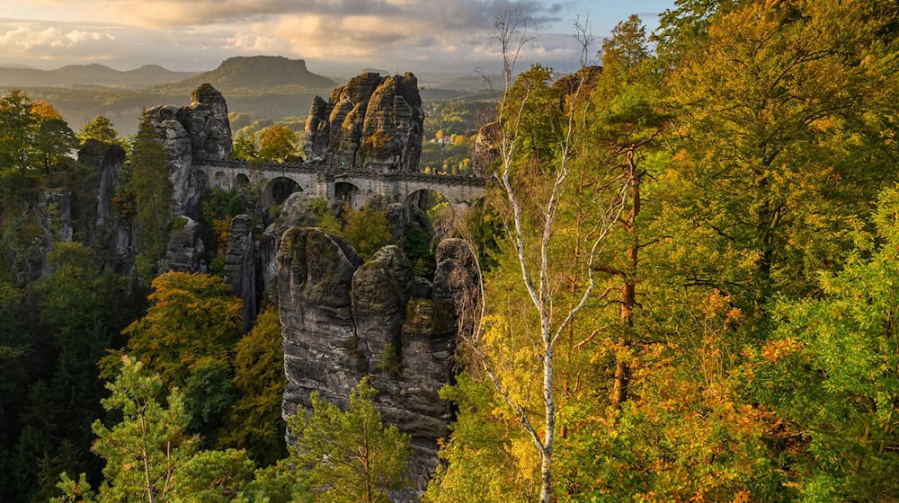 The famous area high above the Elbe with the Bastei rock and bridge and over a million visitors a year is one of the most striking places in the tourist region / Photo: Robert Michael/dpa