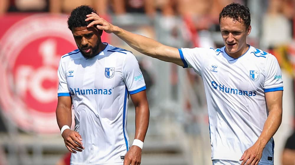 Martijn Kaars (r), who provided the assist, and Xavier Amaechi, who scored after the 1:0 goal / Photo: Daniel Karmann/dpa