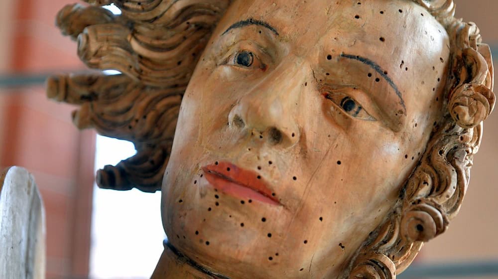 The head of the figure of St. George on the altar of St. Mary's Church in Rötha - where the state-wide opening of this year's Monument Day will take place. (Archive image) / Photo: picture alliance / dpa