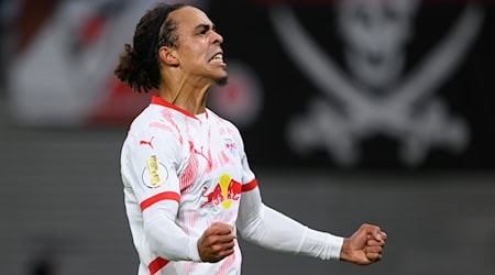 Yussuf Poulsen celebrating his first goal / Photo: Hendrik Schmidt/dpa