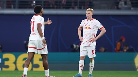 Nicolas Seiwald (d), del Leipzig, conmocionado tras encajar el gol del empate a uno / Foto: Jan Woitas/dpa