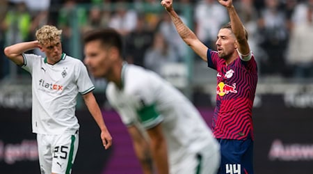 Kevin Kampl celebra la victoria del Leipzig en Gladbach la temporada pasada / Foto: Marius Becker/dpa