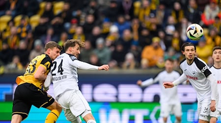 Christoph Daferner (l) gave Dynamo Dresden the lead / Photo: Robert Michael/dpa/ZB