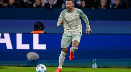 Justin Njinmah amenaza con perderse el partido del Werder contra el Leipzig. / Foto: David Inderlied/dpa
