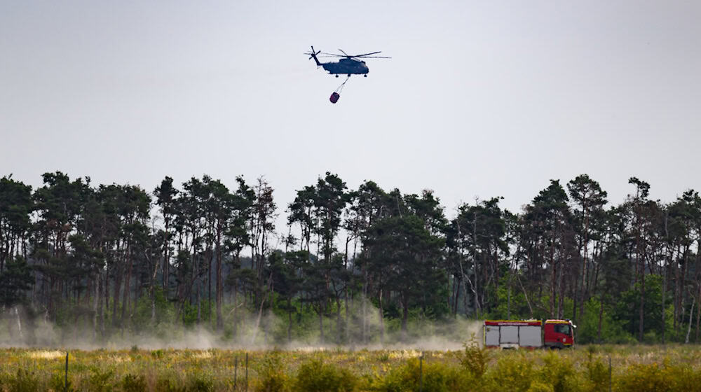 Wird Regen Entspannung im Brandgebiet bringen? / Foto: Robert Michael/dpa