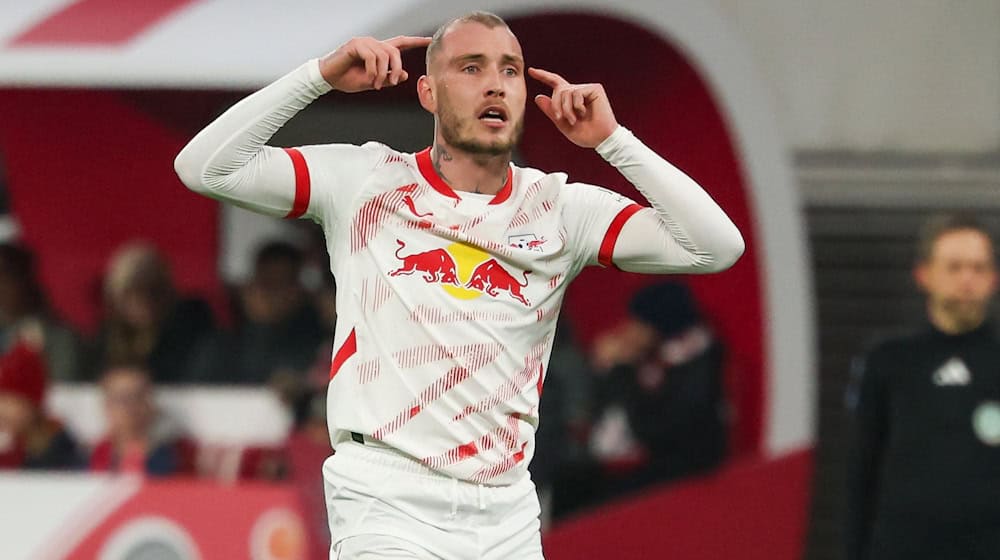 David Raum will lead RB Leipzig onto the pitch at FC Bayern as captain.  / Photo: Jan Woitas/dpa