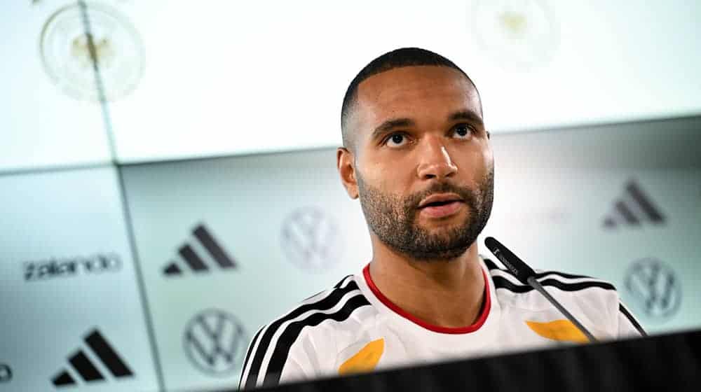Jonathan Tah spoke about the special challenges facing two young national team colleagues. / Photo: Julian Stratenschulte/dpa