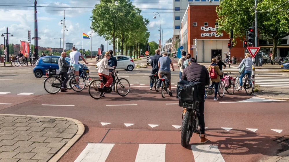 Crossroads with cyclists in Amsterdam