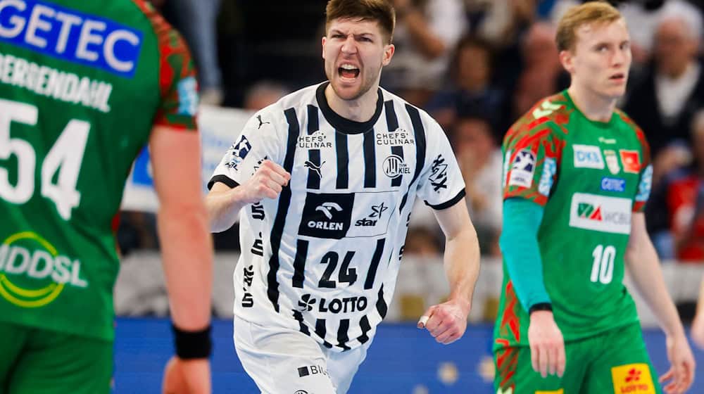 Kiel's Lukas Zerbe (M) celebrates one of his goals / Photo: Frank Molter/dpa