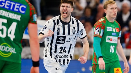 Kiels Lukas Zerbe (M) bejubelt einen seiner Treffer. / Foto: Frank Molter/dpa