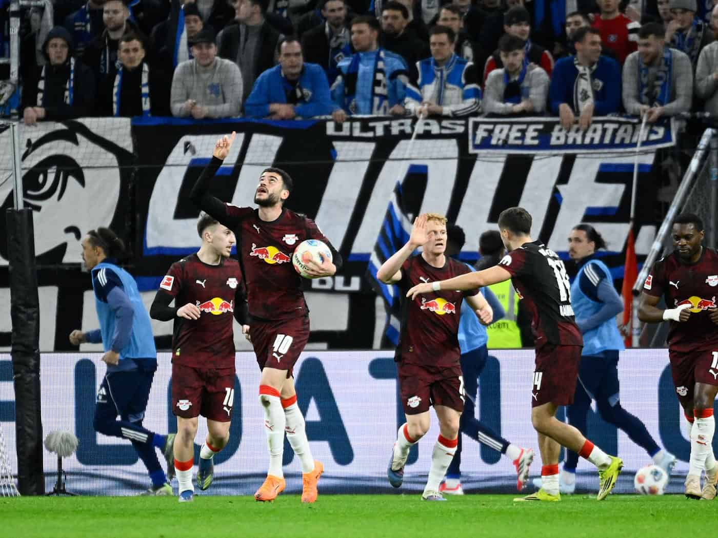 Rômulo (RB Leipzig) celebrates after his goal to make it 1:1 / Photo: Gregor Fischer/dpa
