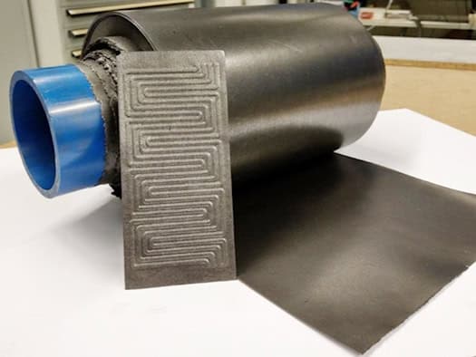 Lightweight composite materials replace expensive titanium in new fuel cell components.